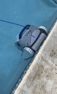 Pool vacuum helps control dirt and dust blown in swimming pool in St. George Utah